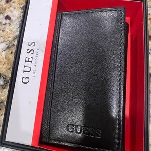 GUESS Black Leather men's wallet NEW.  Will send more pics.